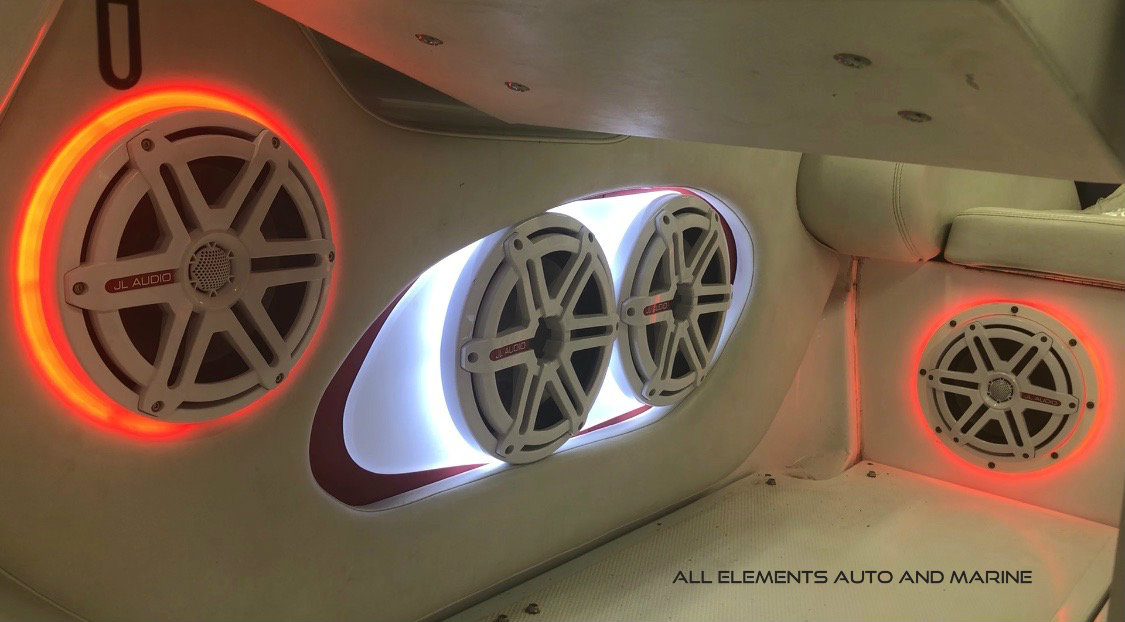 red and white backlit boat audio installation